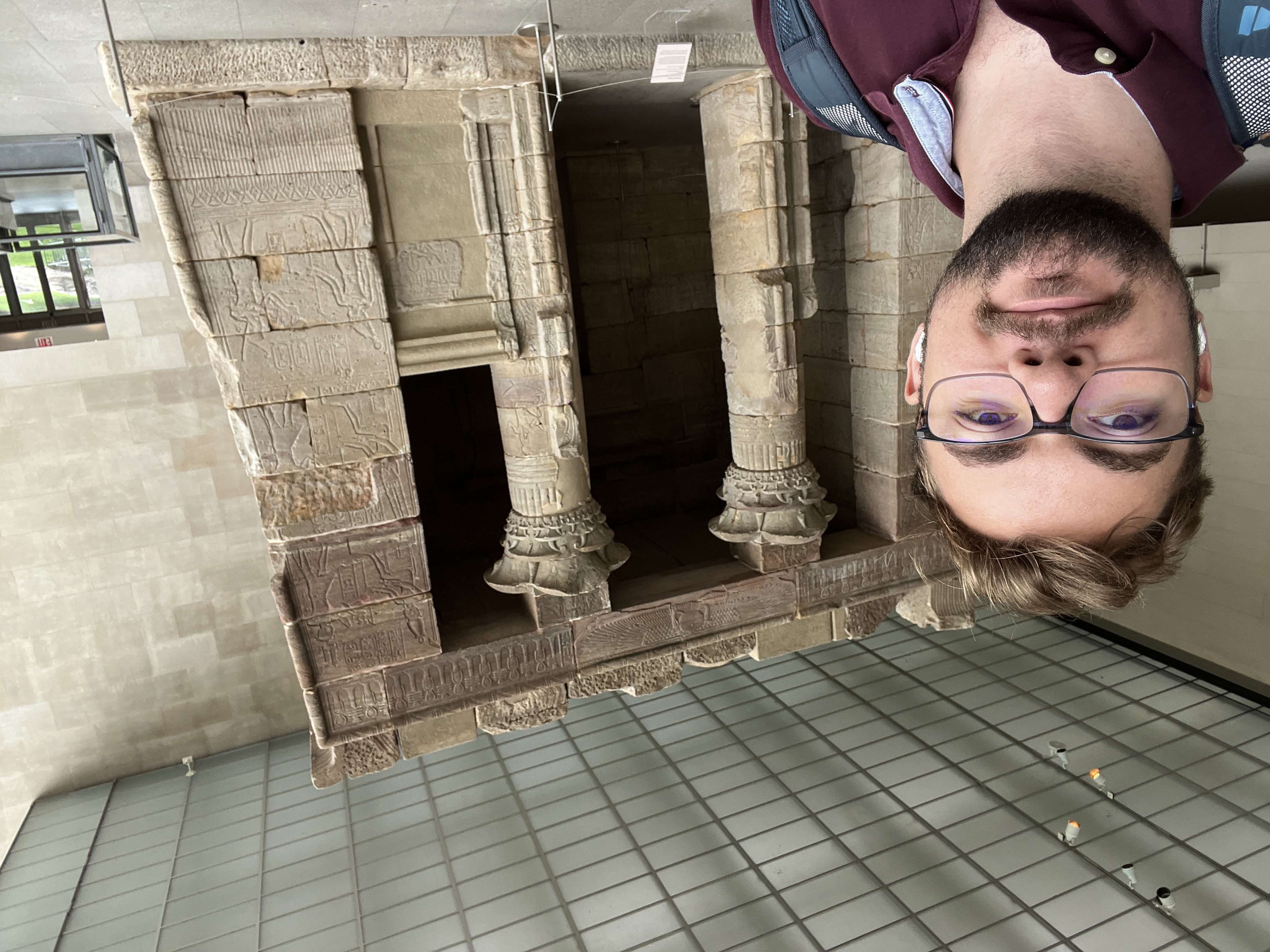 Hunter next to the Temple of Dendur inside the MET